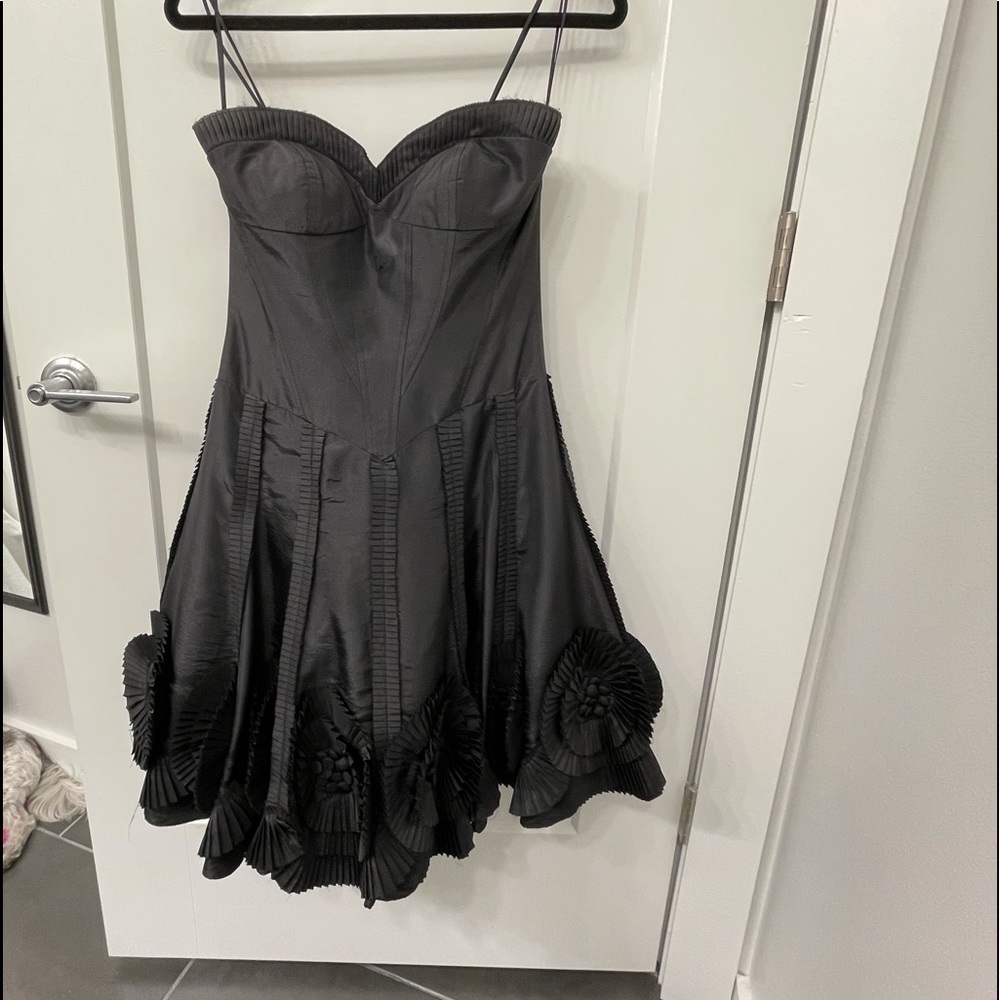 Black strapless formal bustier-style dress with flare out skirt